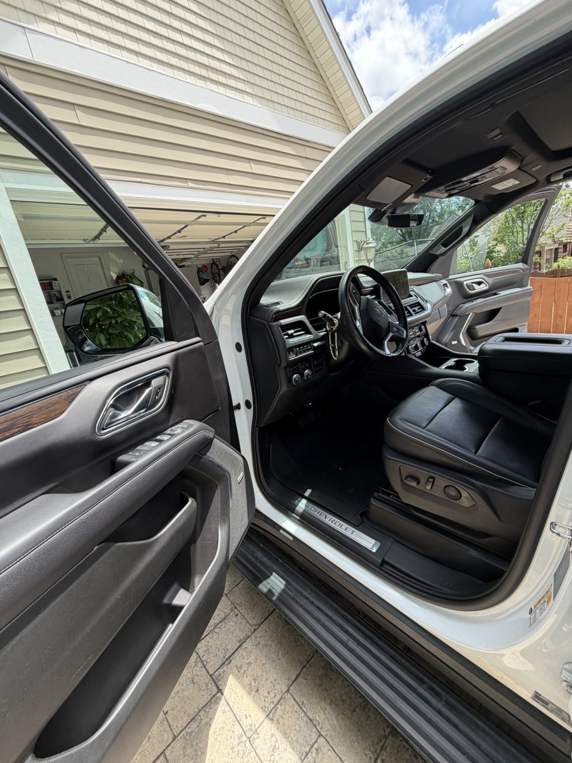 Chevy Tahoe interior detail — clean seats and dashboard by Signature Mobile Detailing