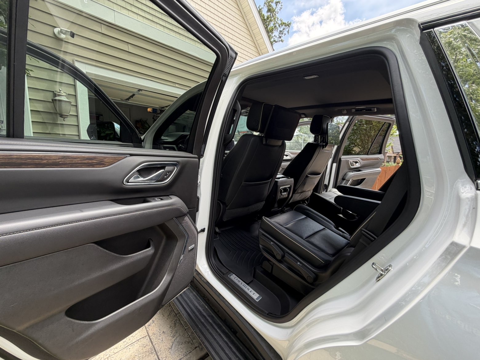 Chevy Tahoe interior detail — second row seats cleaned by Signature Mobile Detailing