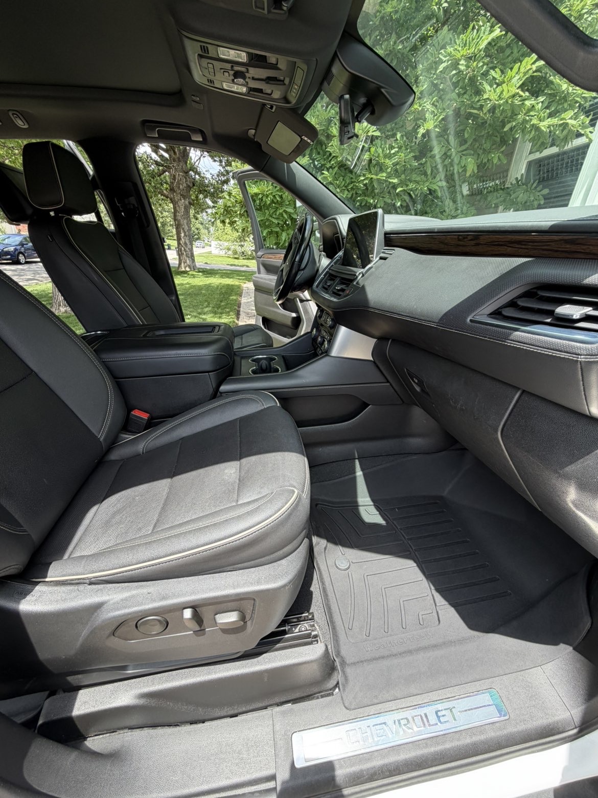 Chevy Tahoe interior detail — dashboard and console cleaned by Signature Mobile Detailing