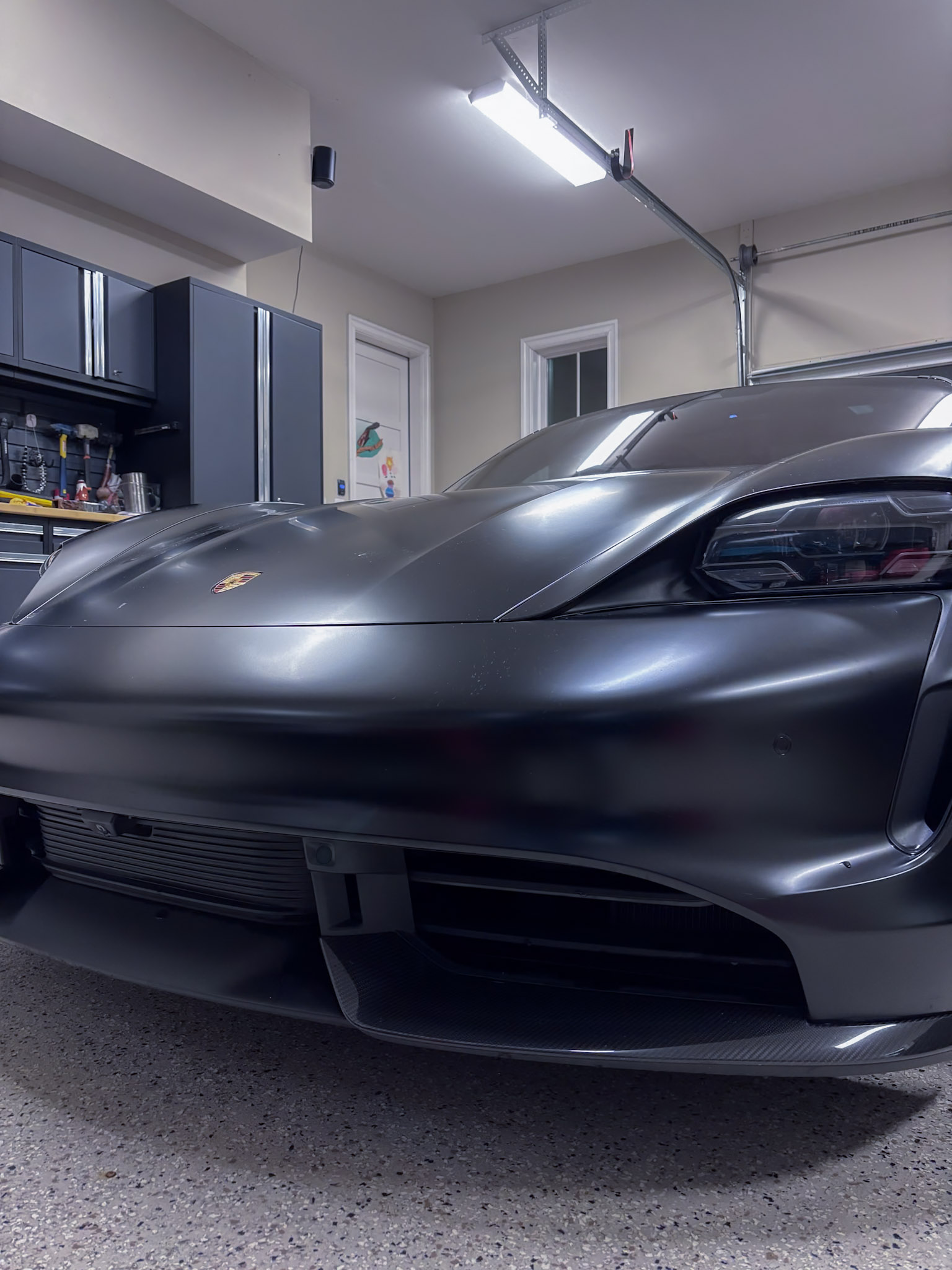 Matte black Porsche Taycan exterior detail — Signature Mobile Detailing Chesterfield MO
